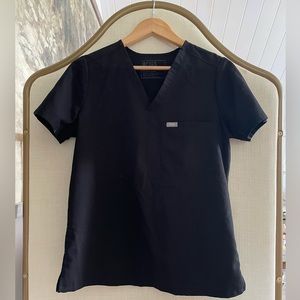 Two tops! Gently used. Worked in Medical Aesthetics.